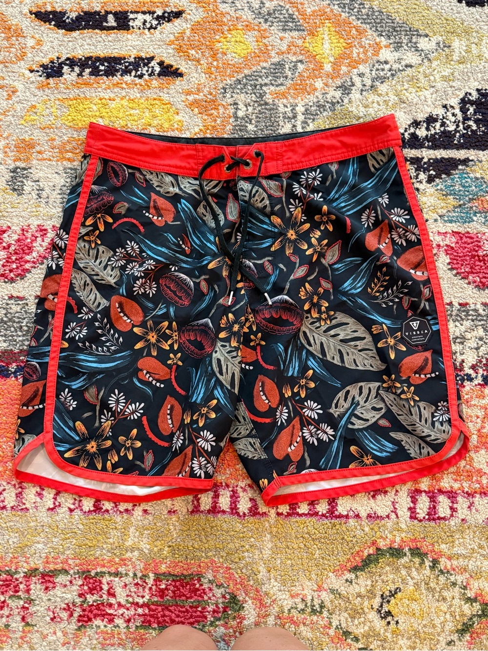 VISSLA Black Floral Leaf Print Board Shorts with Red Trim